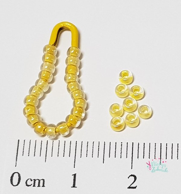 Preciosa Rocailles - 2,6 mm - Klar mit Farbeinzug Gelb